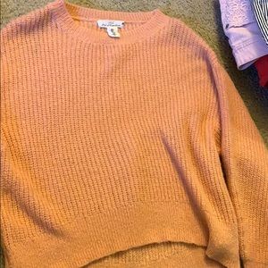 Pink knitted sweater